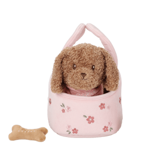 Plush dog in a bag