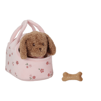 Plush dog in a bag