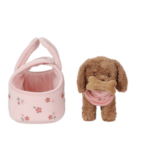 Plush dog in a bag