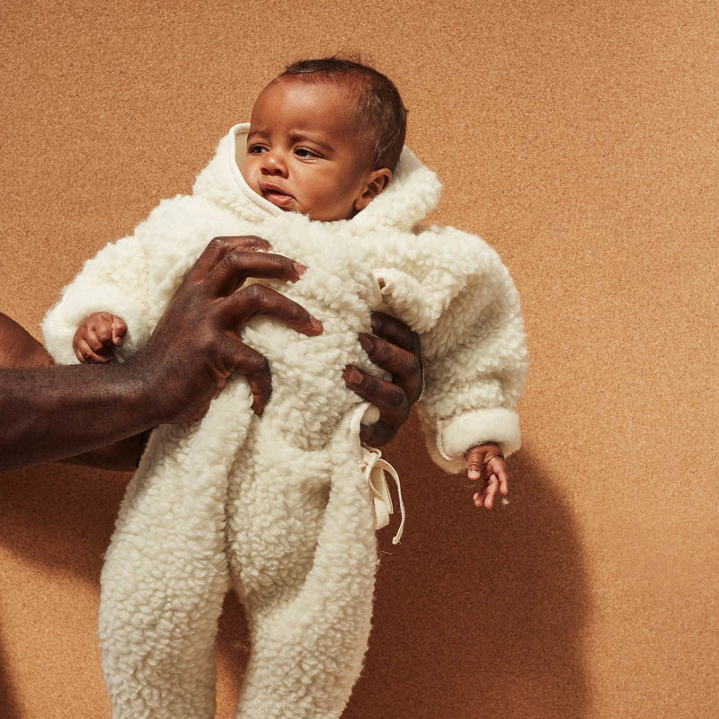 MILK MERINO SNUGGLESUIT